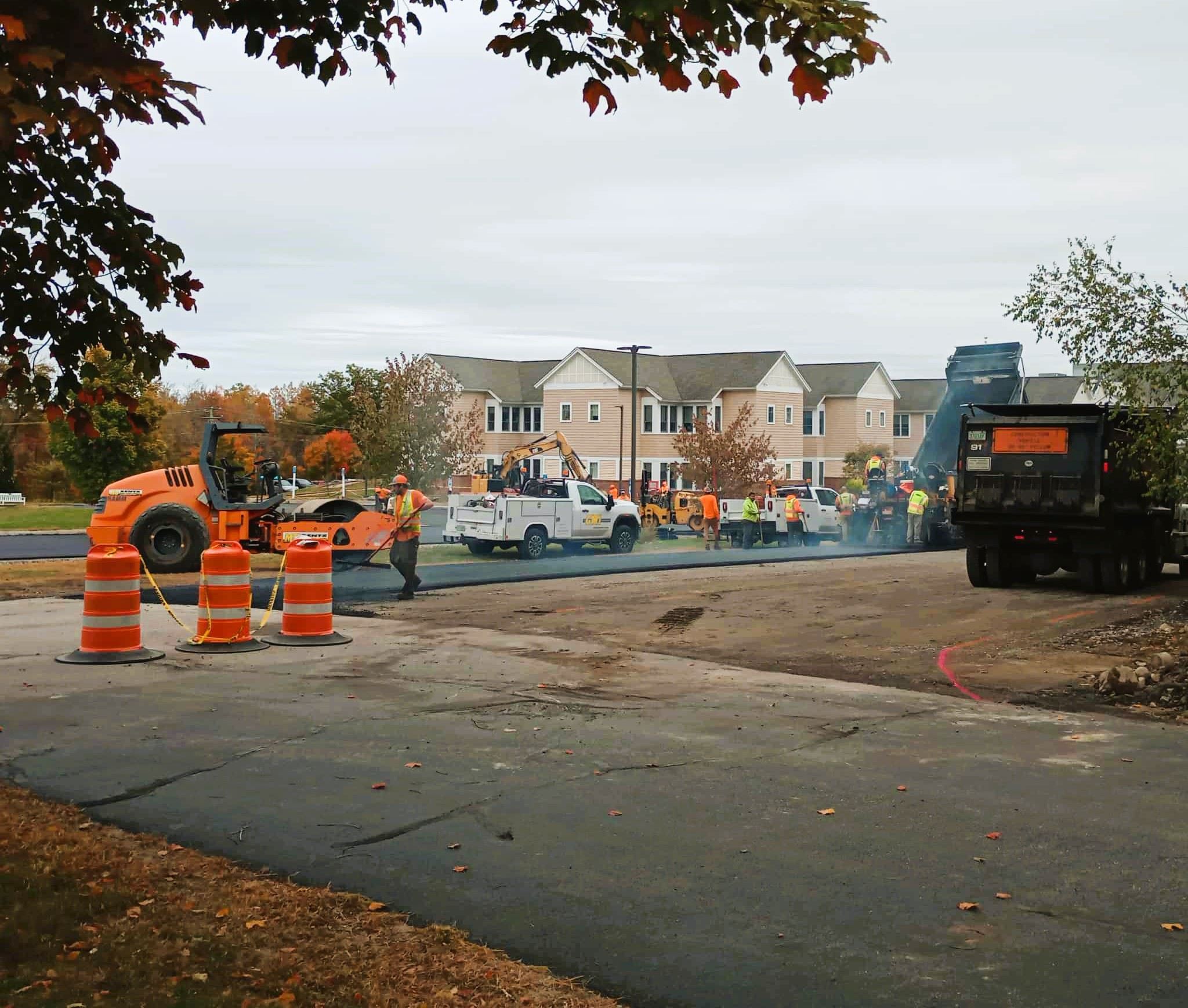 Paving crews work on the main entrance road leading to the nursing home